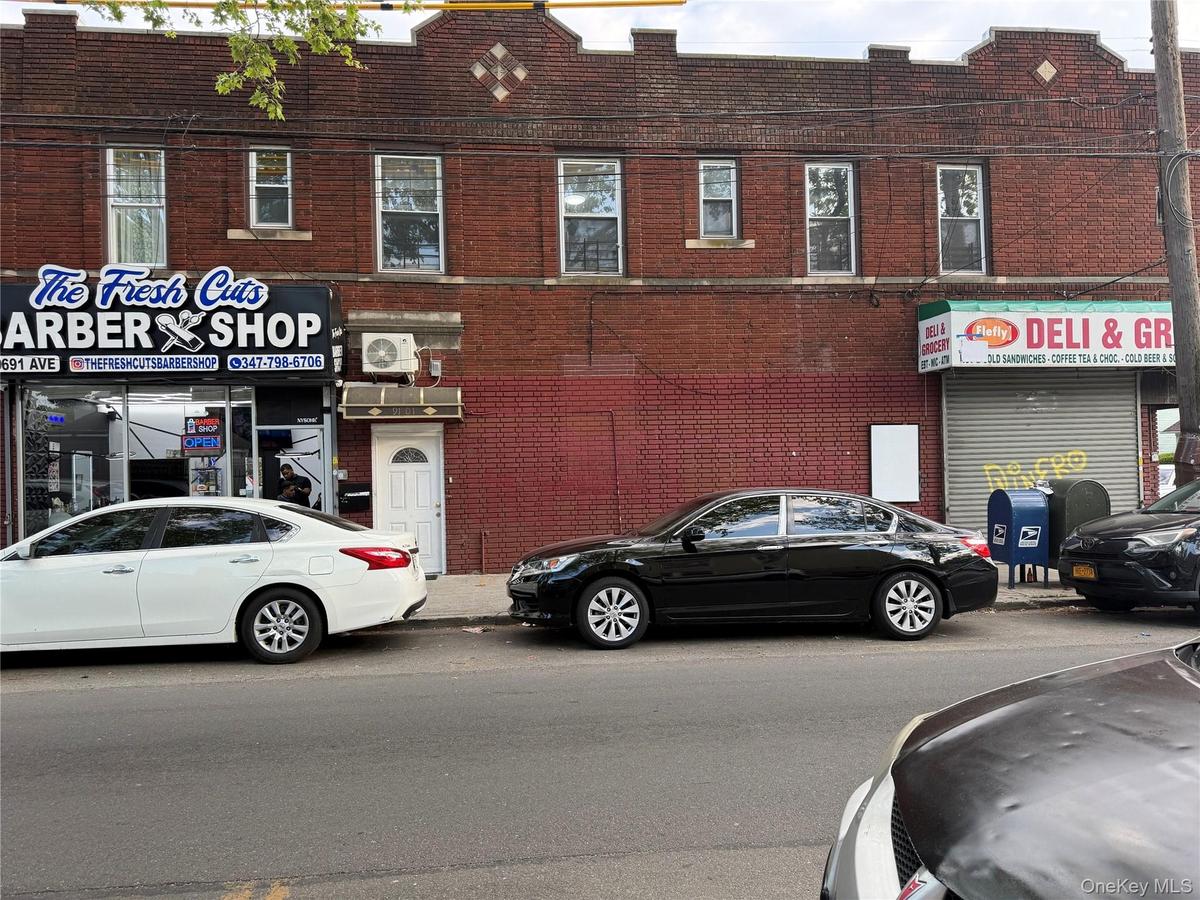 FRONT BUILDING 3 STORES 2 APTS
