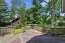 Expansive wood deck with a full railing system24' X 16'