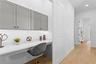 Desk unit with barn door, optional upgrade as shown in 470 Gilman