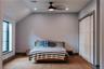 Bedroom with wood finished floors, lofted ceiling, a closet, a ceiling fan, and recessed lighting