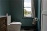 Bathroom with wood finished floors and vanity