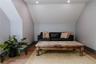 Living area with wood finished floors, vaulted ceiling, and recessed lighting
