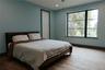 Bedroom with wood finished floors and recessed lighting