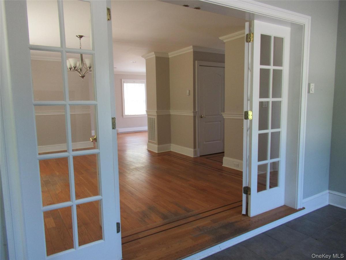 French Doors from Sunroom to Dining Room
