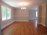 Hardwood floors, Chair rail, Crown molding and Chandelier
