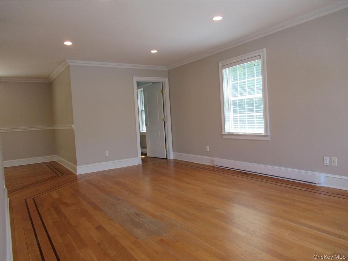 Hardwood floors, Crown Molding and Recessed Lighting
