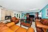 Huge Family room adjacent to pool area with French Doors