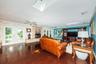 Huge family room with French doors to pool area