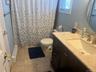 Full Bath with access to Primary Bedroom.