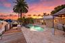 WOW! Your Ocean Access, Waterfront Lifestyle at it's Finest! 40' Dock, 70' Seawall, Freeform Pool with Rock Waterfall, Covered Patio Space for Fail Sa