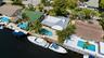 Aluminum Roof and Travertine Pavers 2024, Tented in Jine 2026 are just a Few of the Updates of Your Future home!