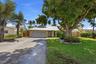 Beautiful, Mature, Lush Landscape surrounds the property. Lots of Parking with a Wide Gate on the South Side of the Home.