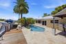 WOW! Your Ocean Access, Waterfront Lifestyle at it's Finest! 40' Dock, 70' Seawall, Freeform Pool with Rock Waterfall, Covered Patio Space for Fail Sa