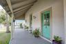 Beautiful and timeless wrap around portico