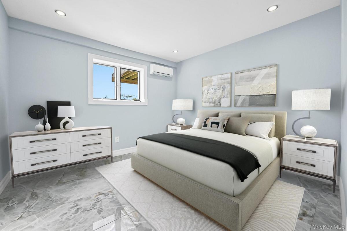 Bedroom featuring recessed lighting and a wall mounted air conditioner