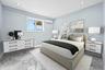 Bedroom featuring recessed lighting and a wall mounted air conditioner