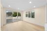 DEN WITH SLIDING GLASS DOORS TO THE BACKYARD