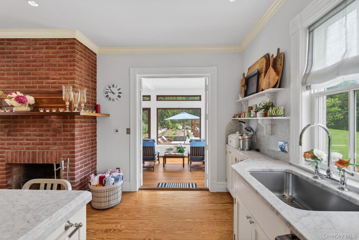 Kitchen opens to screened in porch