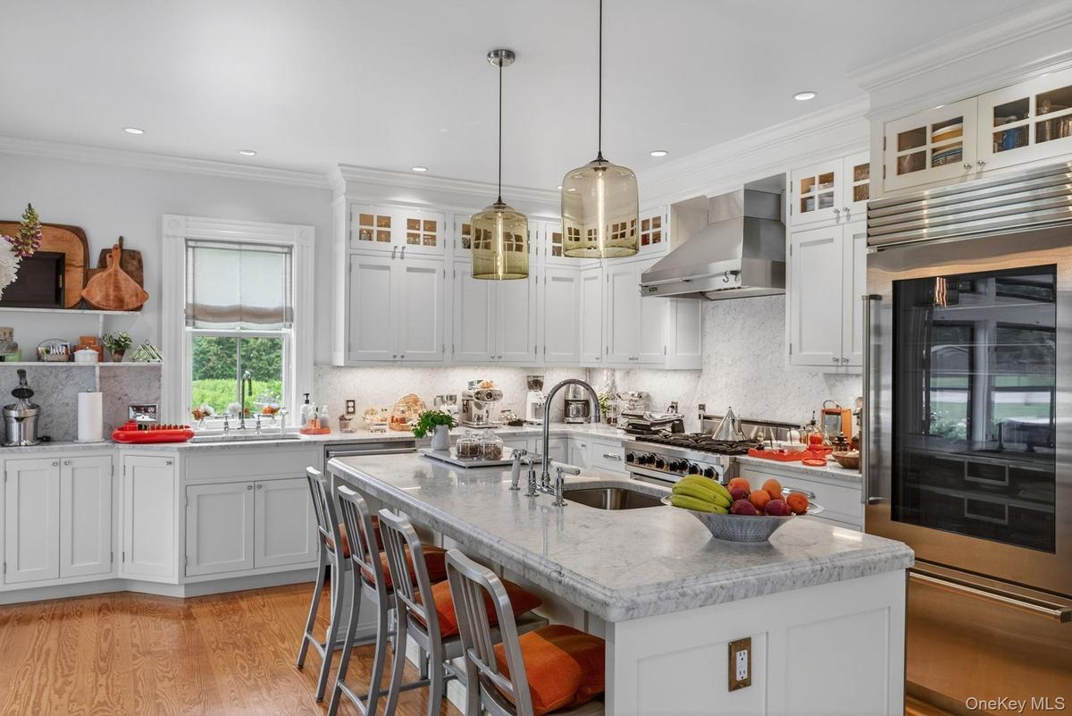 Carrara marble counters, two sinks