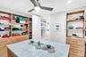 Owners Suite Walk-in Closet with Built-ins