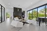 9741 SE Gomez piano room with fire place