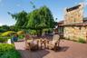Enjoy the ample shade under the weeping birch, or one of the many ornamental trees on the property*virtually staged*