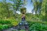 Mature gardens graced with statues, urns and water features are displayed throughout the property.  All urns and planters have automatic drip watering