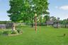 Manicured park-like acres throughout the property