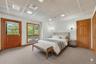 Direct access to the hot tub and pool deck from the lower level bedroom