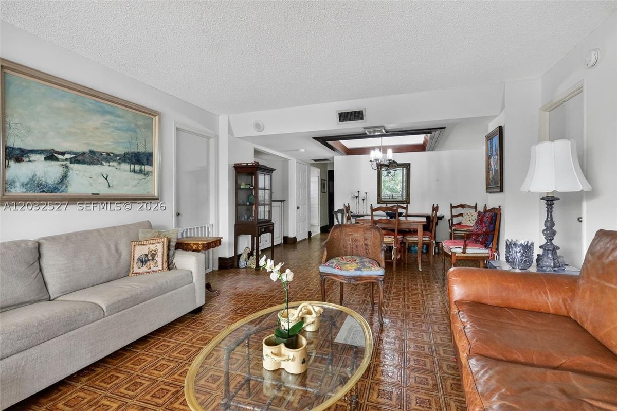 Living room looking to dining space