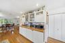 View of Kitchen into DR