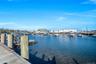 Dock area featuring a water view and view of marina