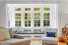 Sunroom featuring radiator heating unit