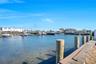Dock with a water view and a residential view