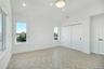 Unfurnished bedroom with lofted ceiling, recessed lighting, and a closet