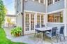 View of patio featuring french doors and outdoor dining space