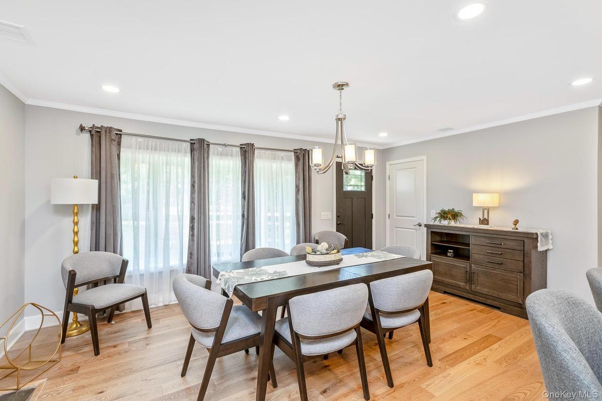 Formal dining room with a additional wood burning fireplace