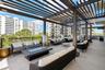 Outdoor gathering space and gril area located on the amenties deck