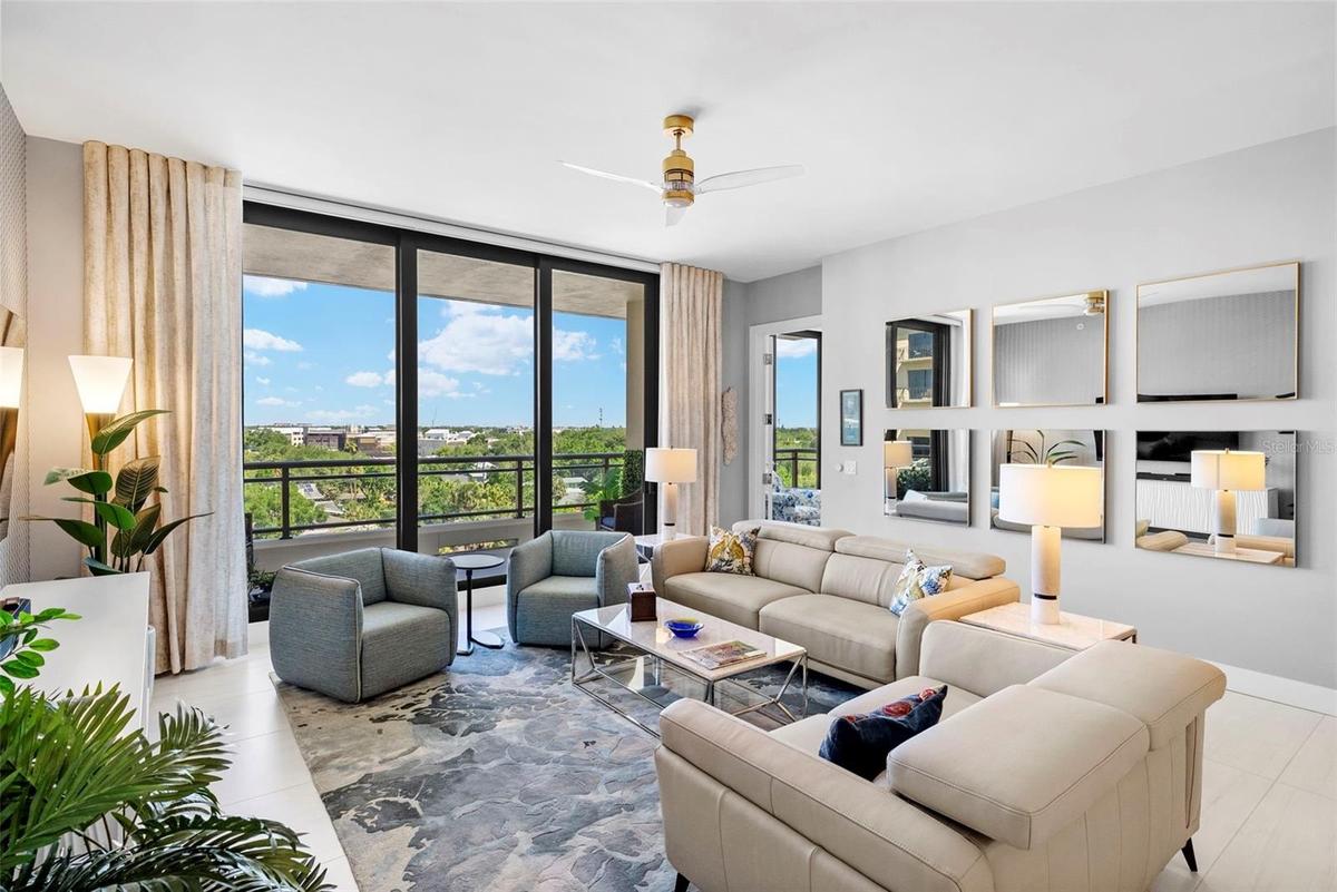 Primary living space with access to the private balcony