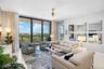 Primary living space with access to the private balcony