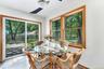 The cheerful easy eat in kitchen offers plenty of room for making entertaining simple.