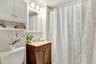 Bright and refreshed, the full bath offers timeless finishes with a clean, classic design.