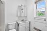 Primary Bathroom offers a bath with shower