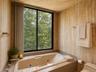 primary bathroom and a generous walk-in closet area, offering both comfort and convenience.