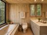 primary bathroom and a generous walk-in closet area, offering both comfort and convenience.