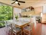 Open Kitchen to Breakfast area with floor to ceiling windows with tons of natural light
