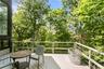 A spacious deck overlooks acres of peaceful reservoir land, offering a rare sense of privacy and natural beauty. Enjoy quiet mornings, outdoor dining,
