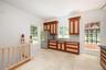 Kitchen with granite countertops and custom hard wood cabinets
