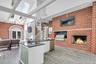 Indoor bbq and Fireplace in Sunroom with full bath