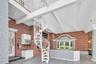Spiral Staircase in Sunroom/In Door Pool, to Primary Suite